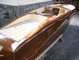 Laquering the deck and hull.